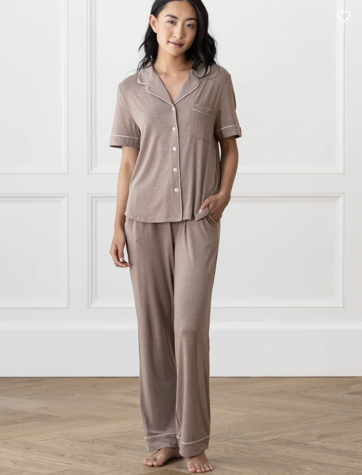 woman in button up postpartum nursing pajamas
